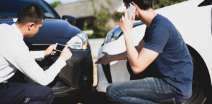 Drivers Documenting Accident Scene