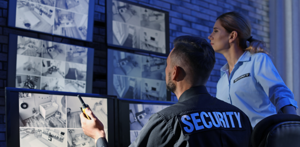 Security Officers Watching Surveillance Footage