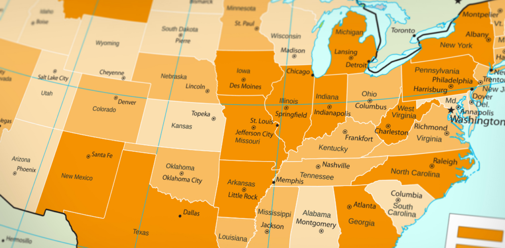 Close-up of a U.S. map showing states and major cities highlighted in shades of orange and yellow